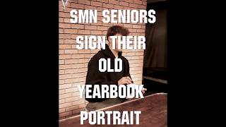 25-26 SMN Seniors Sign Freshman Yearbook Portrait