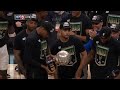 Bucks celebrate with the NBA eastern conference finals trophy after game 6 vs Hawks