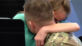 Military dad surprises daughter at school