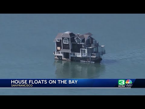 Entire house is seen floating on San Francisco Bay