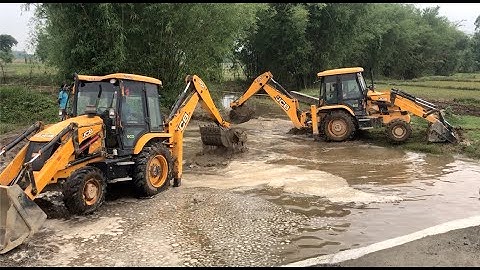 Two Backhoe 3DX s Working Together, JCB Making A Bridge Foundation