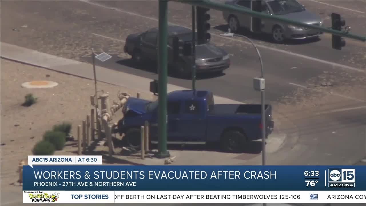 Crash prompts evacuations after gas main leak - YouTube