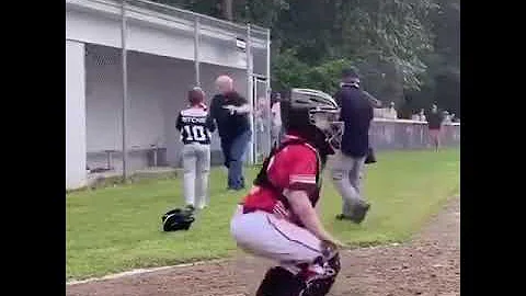 Kid accidentally hits coach in the head with a baseball bat
