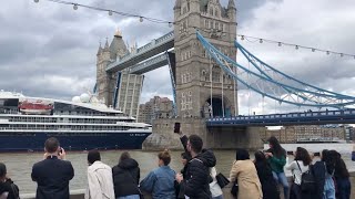 Tower bridge opening and closing for a huge cruise ship || London