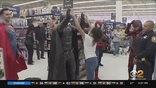 Nassau’s ‘Shop With A Cop’ Partners Kids Who’ve Suffered Hardship With Superheroes