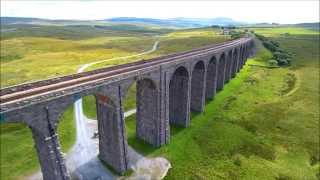 Ribblehead viaduct and steam train from the air by quadcopter