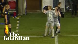 Substitute poked in eye by teammate in touchline high five, then goes off injured