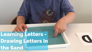 Learning letters - Drawing Letters in the Sand - Montessori kids activity - Learning to write Learning letters - Drawing Letters in the Sand - Montessori kids activity - Learning to write