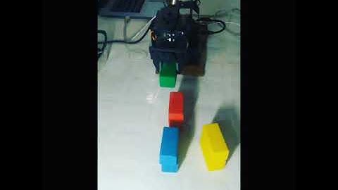 Robotic arm sequenced block stacking task