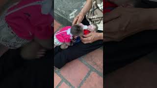 Grandma Is Giving Her Baby Milk.