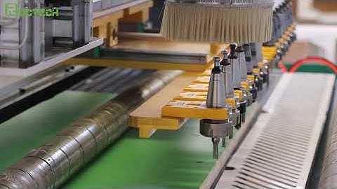 Auto labeling machine with auto loading and unloading platform.