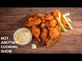 CRISPY OVEN BAKED BUFFALO CHICKEN WINGS WITH HOMEMADE BLUE CHEESE DRESSING