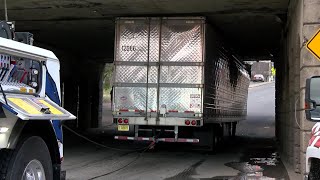 RAW VIDEO: Truck gets stuck under Durham railroad bridge