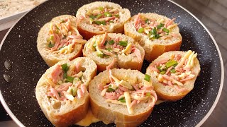 A simple appetizer - a baguette baked with stuffing. Everyone will love it!