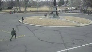 New photographs show Cobb County 18-year-old charging toward US Capitol with loaded shotgun