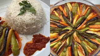 الذ صينية خضار بالصلصة مع رز أبيضdelicious vegetables dish with tomato sauce and white rice