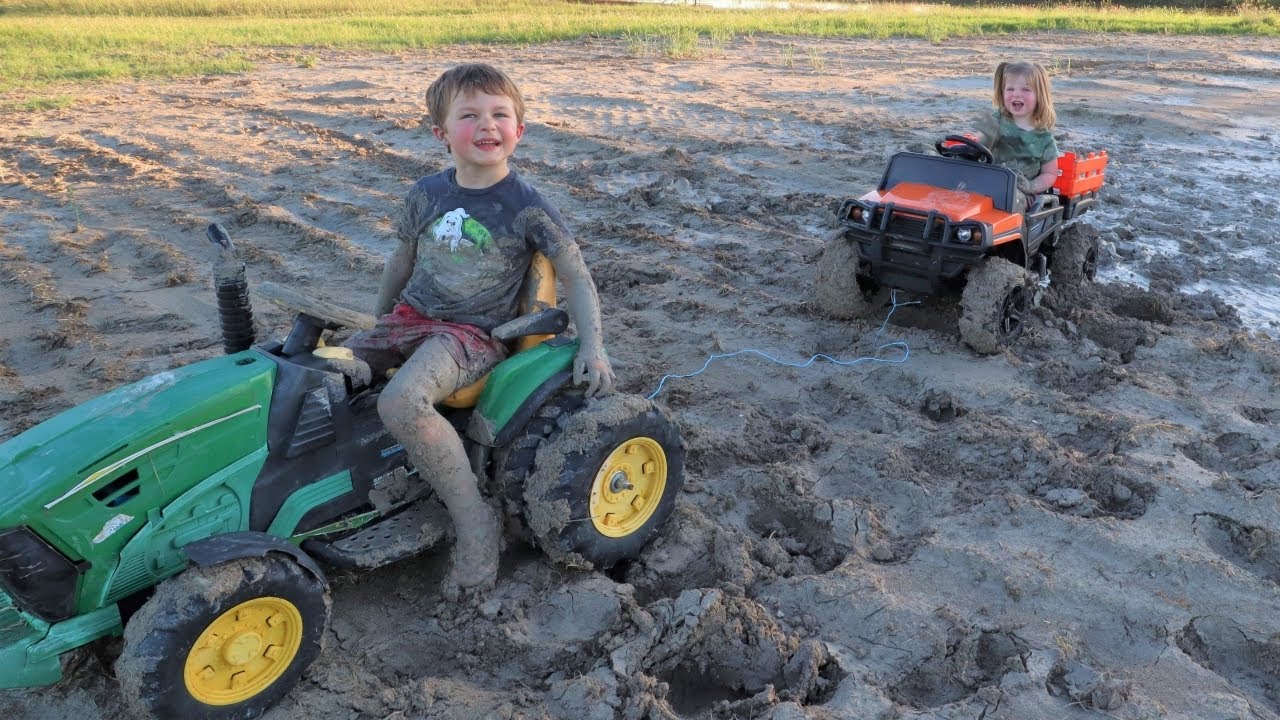 Playing in the mud with tractors can be fun for both kids and adults. It can also be a way to learn 