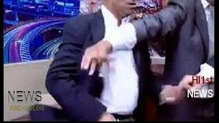 Politician Pulls Gun During TV Show argument..!( Jordanian MP Throws SHOE!..pulls gun? -- News Story