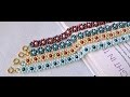 Vidéo 79(P) Comment faire un bracelet de fleur avec perles en verre nacré