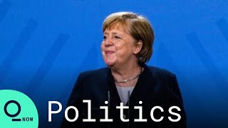 Merkel Wishes Scholz Good Luck as New German Chancellor screenshot 2
