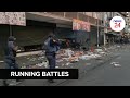 WATCH | Johannesburg police face-off with looters, fire stun grenades and rubber bullets