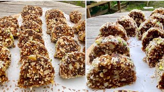Date rolls , sugar free Ramadan sweet snacks with nuts and dried fruits .