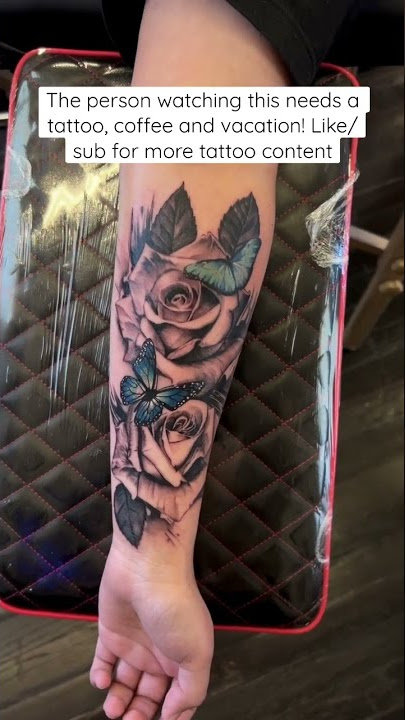 Rose and butterfly tattoo