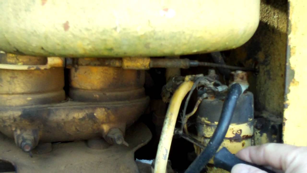 Adams Motor grader start up.