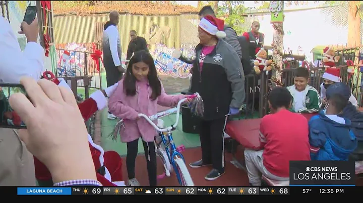 'Sweet' Alice Harris gives toys and bikes to LAUSD...