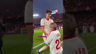 Why Do Football Players Walk Out With Kids #football