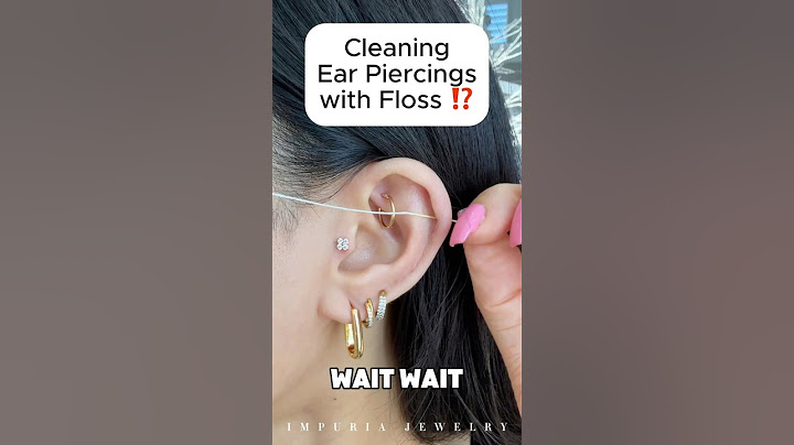 Cleaning My Ear Piercings with Floss?!😱