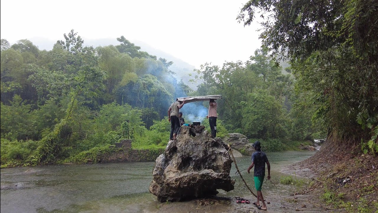 Green fig & saltfish - Jamaican cooking st. Lucia's national dish on Hugh rock in rain