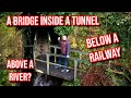 Discovering a bridge inside a tunnel below a railway  above a river  why