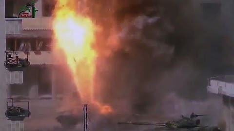 Syria - T72 tank gettin hit antitank rocket rpg-29 FSA vs Al Assad