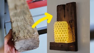 A rustic sconce made of wood I found in the trash