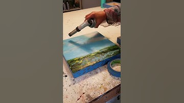 Fusing layers of encaustic wax