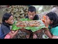 All three kids cook food to eat