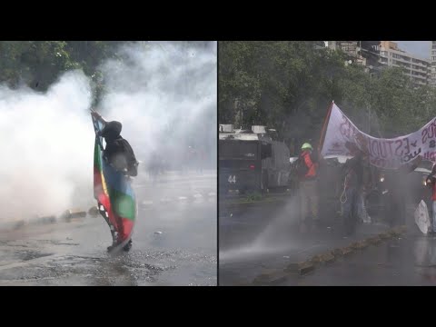 Chile students, police clash at protest over feared education cuts | AFP