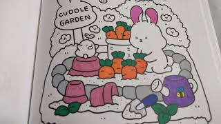 dessin d'un lapin plantant des carottes