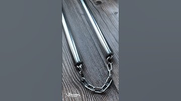 Côn nhị khúc inox êm tiếng để tập luyện võ thuật