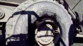 removing a 26.5r25 tire on a cat 735 (3 piece rim)
