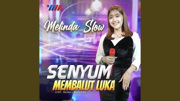 Senyum Membalut Luka