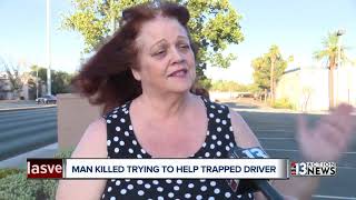 Man killed trying to help trapped driver