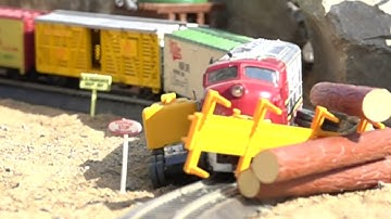 Hot Wheels Crashing into HO Scale Trains - Crashes, Derailments and Fails in 1000 FPS - Part 4