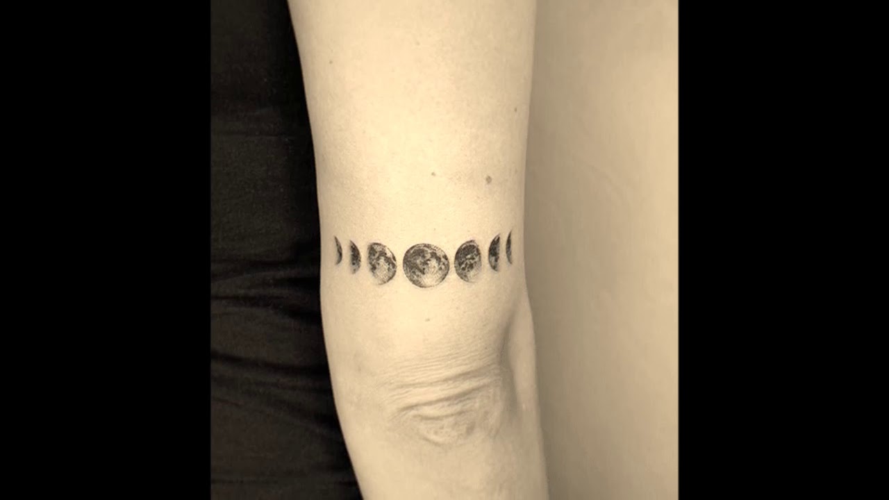 Moon phases realistic portrait black and grey sleeve tattoo