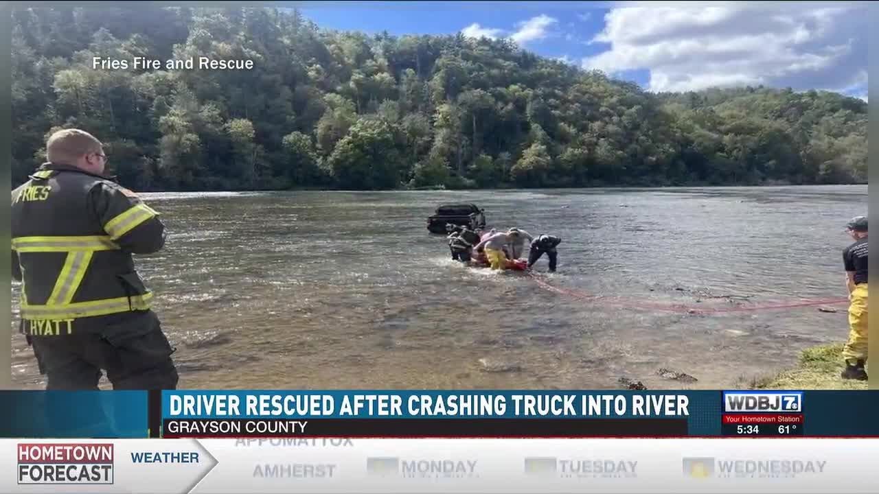 Driver Rescued After Crashing Truck Into River - YouTube