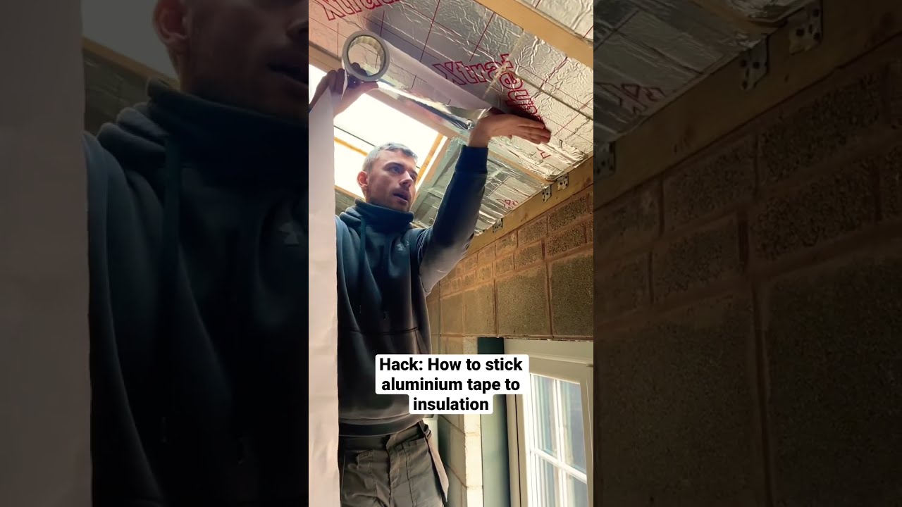 Hack: Sticking aluminium tape to insulation #diy #houseextension #renovation #building