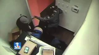 Two suspects seen on video robbing cell phone store