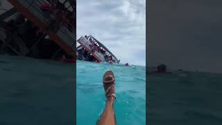 Cruise ship sinking with passengers jumping overboard 😱