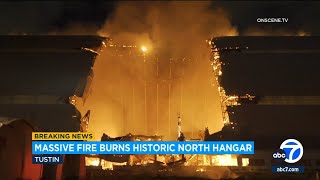 Massive fire burns through historic hangar in Tustin